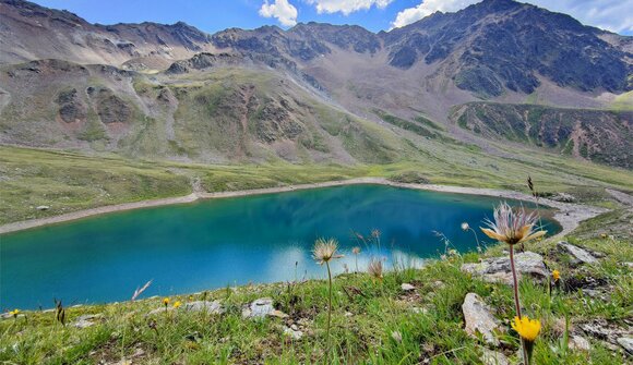 Mountain lake & rustic alpine pasture