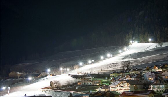 Night skiing with floodlights